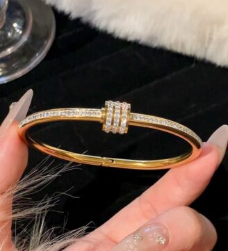 Gold cartier screw bracelet