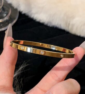 Gold bracelet with stones