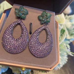 Pineapple shaped stainless steel earrings. Also available in gold