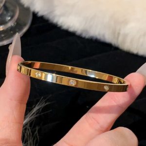 Gold bracelet with stones